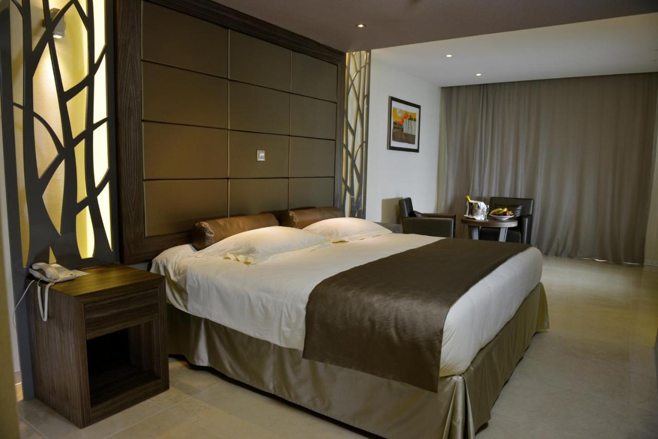 فندق أدامز بيتش أيا نابا المظهر الخارجي الصورة A bedroom at the hotel